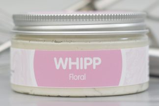 Jar of Floral Whipp on light metallic background