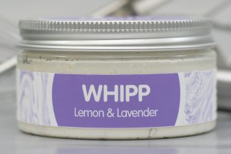 Jar of lemon and lavender Whipp on pale metallic background